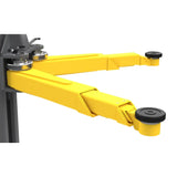 Yellow mechanical arm or boom with black adjustment knobs and a gray mounting base.