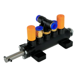 Pneumatic manifold with multiple ports and a central actuator.