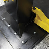 Black metal plate with silver bolts and yellow brackets on Challenger CL16 heavy-duty two-post lift