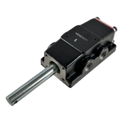 Pneumatic cylinder or actuator with a black body and protruding metal rod.