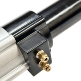 Pneumatic or hydraulic cylinder with gold-colored fittings attached to a black mounting bracket.