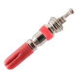 Spark plug with a red insulator and metal components.