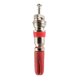 Tire valve stem with a red protective cap.