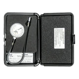 Pressure gauge in a protective carrying case.