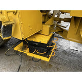 Yellow Esco CribLok Cribbing System base plate with black mounting hardware