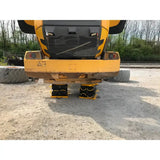 Yellow excavator with Esco CribLok cribbing system and stabilizing blocks on display