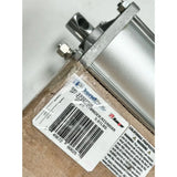 Pneumatic cylinder with a product label and barcode attached.