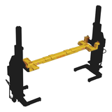 Heavy-duty vehicle lift with yellow support beam and black hydraulic columns.