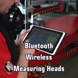 Tablet displaying data, likely connected to wireless measuring equipment.