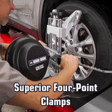 Four-point wheel alignment clamp attached to a vehicle’s tire and rim.