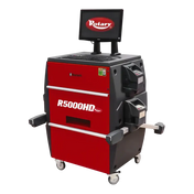 Red and black automotive wheel alignment machine with a monitor display and the model name ’R5000HD’ visible.