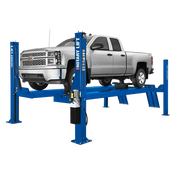 Blue Rotary SMO14EL2 14k four-post lift supporting a silver Chevrolet Silverado pickup