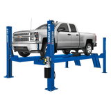 Blue Rotary SMO14EL2 14k four-post lift supporting a silver Chevrolet Silverado pickup