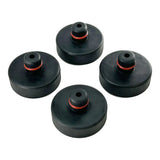 Set of four black circular speaker spikes or isolation feet with red O-rings.